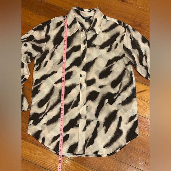 Black and cream zebra print button up blouse with tie at wrist and ruffle cuff - Picture 6 of 7